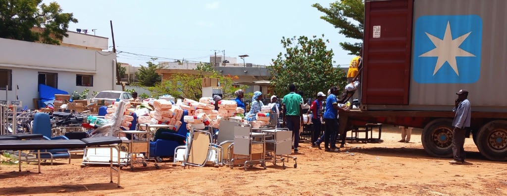 Unloading medical equipment in Senegal